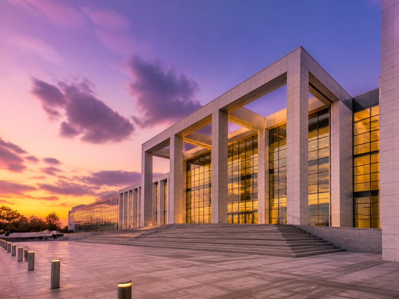 Modern federal government building plaza at golden hour